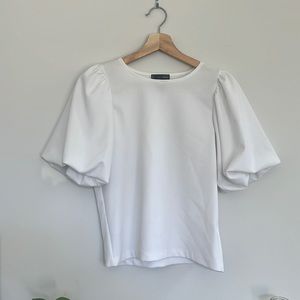 Dramatic sleeve white blouse